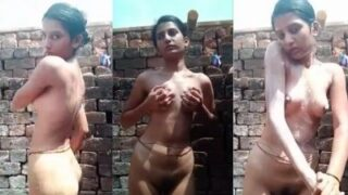 Naked Indian Beauty Bathes Outdoors Under The Open Sky