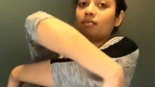 Nisha’s Desi Tease: A Sultry T-shirt Peeling Reveal