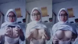 Nurul Maisarah’s Voluptuous Curves In A White Hijab