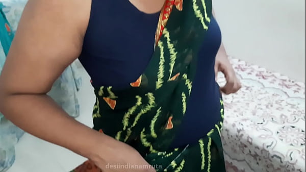 Desi Hot Indian Bhabhi In A Dark Green Saree, Looking Sexy And Cute, Ready To Tease
