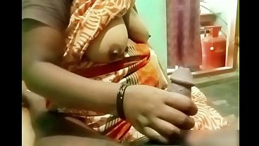 Indian Aunty’s Hand Sliding Along A Young Boy’s Stiff Cock, Making It Throb And Leak